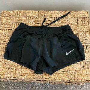 Nike Dri-Fit athletic shorts.